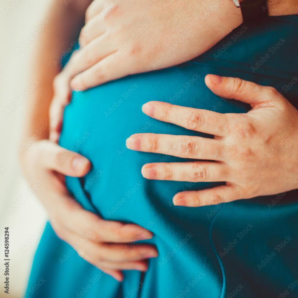 Fototapeta premium young man expecting a child from his beloved woman