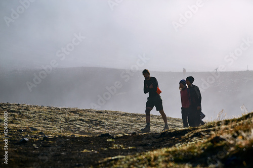 Frozen hikers on the trail at dawn, hiking in Iceland