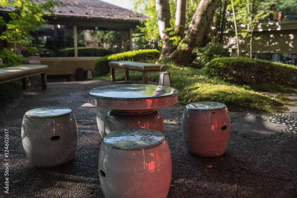 green stone Circle table and chair in the garden.