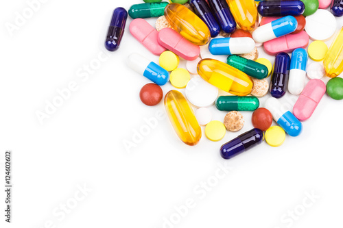 Various color pills and capsules close shot
