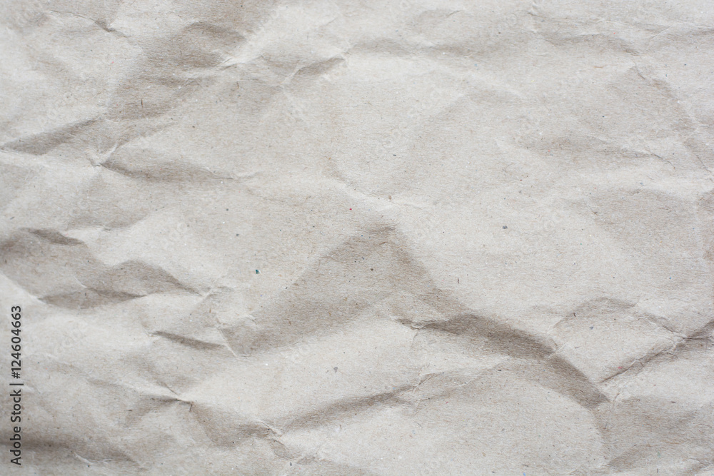 Naklejka premium crumpled cream color tone paper pattern texture background