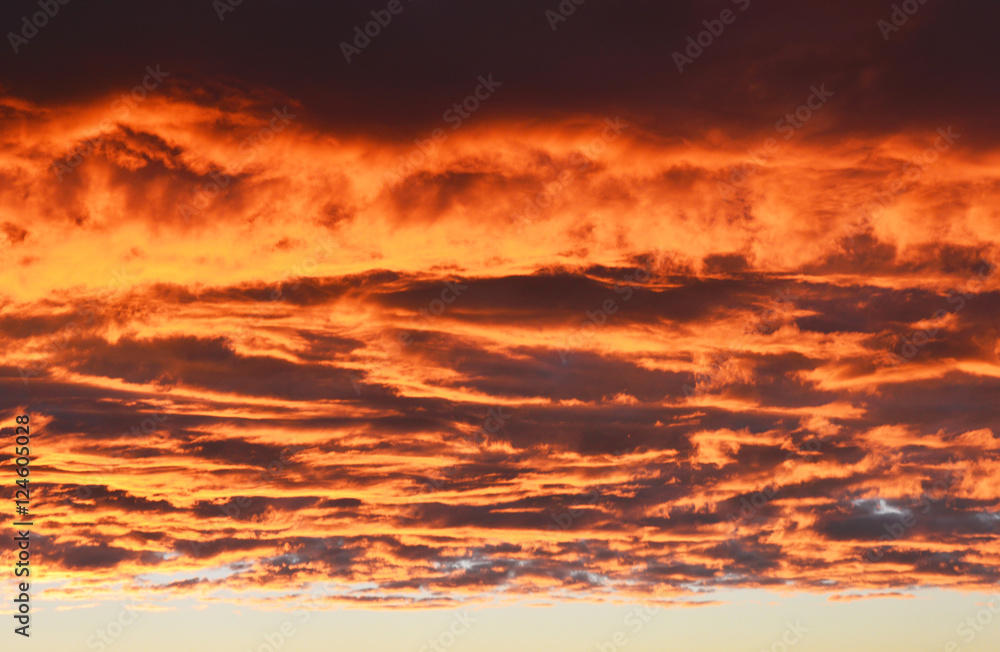 Unusual beautiful clouds in the sky at sunset, without photo filters