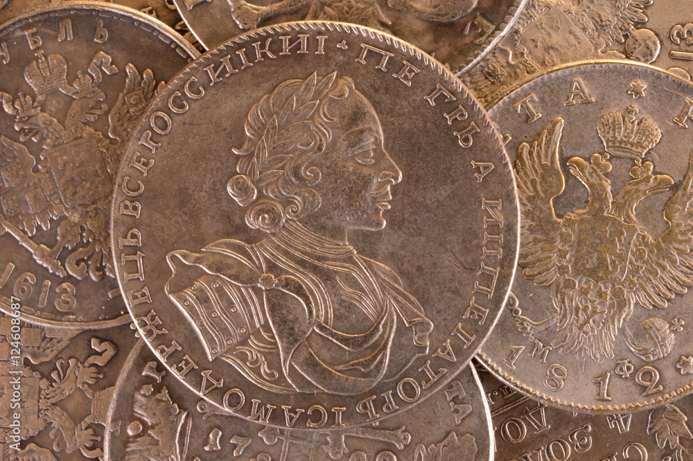 Vintage background silver ruble coin 1722 Russian emperor Peter A. Autocrat of all Russia
