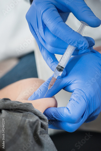 Vaccination. Injecting vaccine