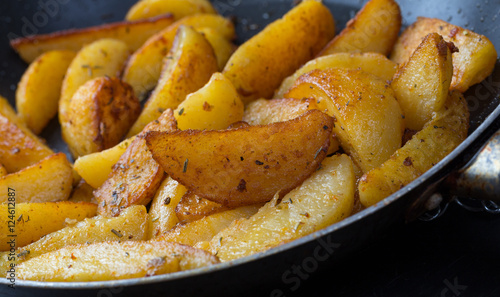 potatoe wedges in a pan