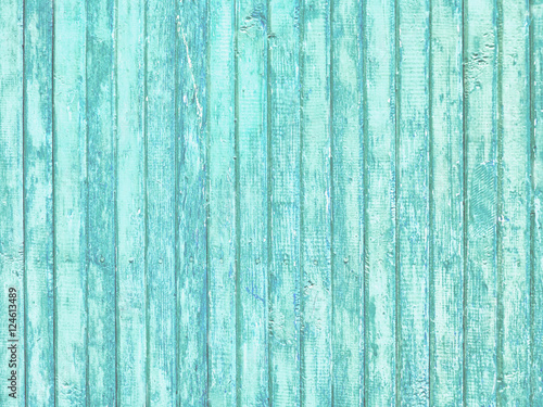 Old wooden painted light blue rustic background, paint peeling