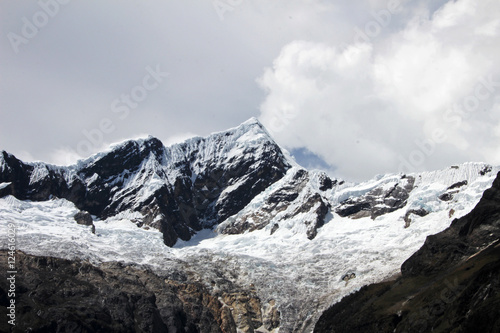 Nice mountain peak with clouds in the peruvian Cordillera Blanca © reisegraf