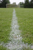 White chalk line on soccer field
