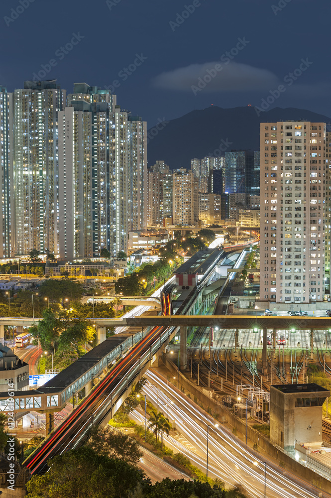 Residential buildings and highway in Hong Kong at night