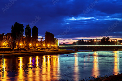 Beautiful reflection of lanterns in the river in the city uzgorod Ukraine.