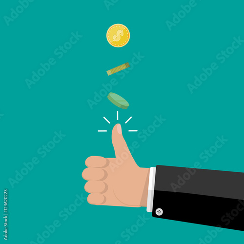 hand of businessman tossing a coin