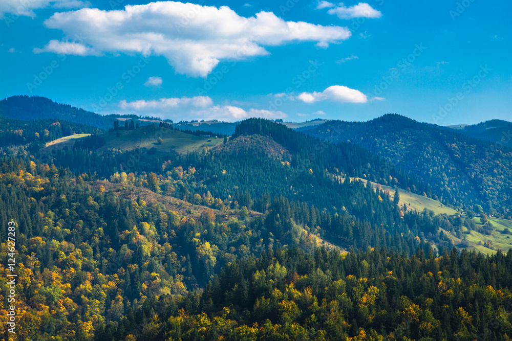 Autumn in the Carpathian hills and sky