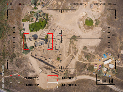 Aiming bomber to the target in the desert. Viewfinder plane.