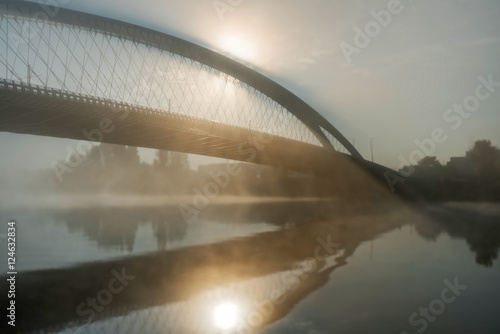 bridge over the calm river