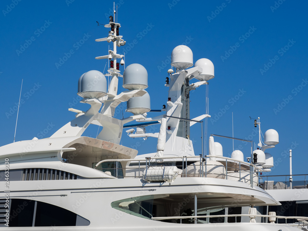 Navigation system antennas of big white motor yacht Navigation system antennas of big white motor yacht
