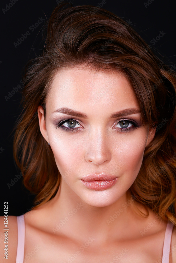 Woman hair style fashion portrait on black background Woman hair style fashion portrait on black background