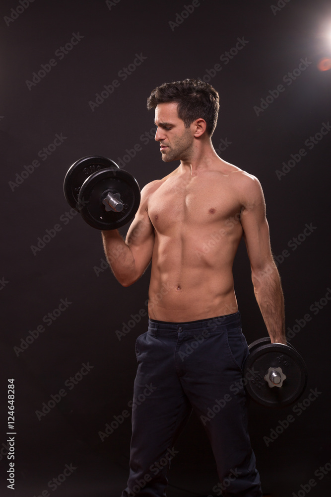 young man fitness shirtless abs nude weights posing biceps arms