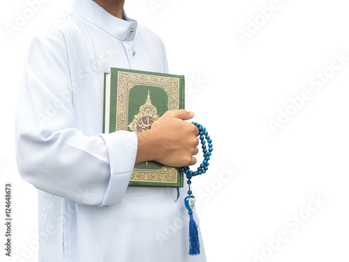 Obraz na plátně Asian muslim child  reads the holy Quran