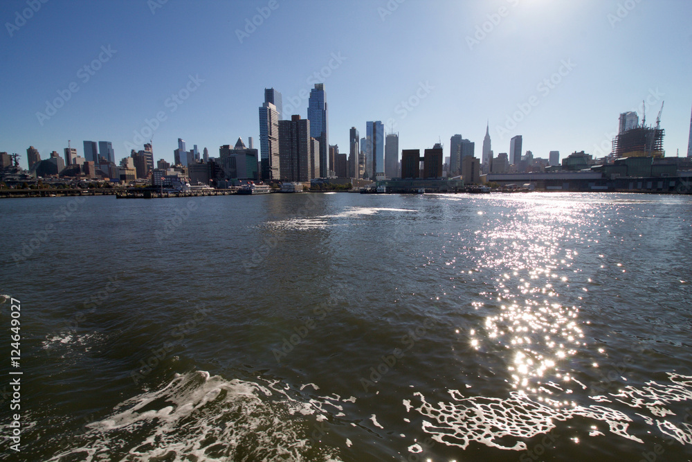 Manhattan skyline panorama from the Hudson river early morning