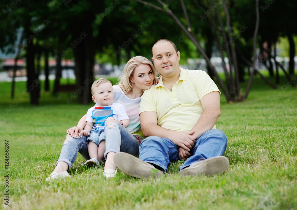 family playing on the grass