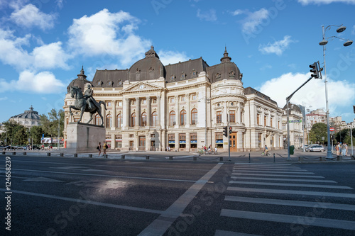 Long exposure aerial shot of the Revolution Square near Victoria Avenue in Bucharest, Romania. Traffic and historical buildings.Bucuresti