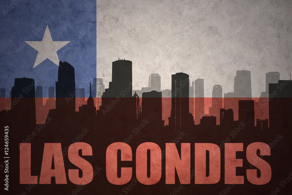 abstract silhouette of the city with text Las Condes at the vintage chilean flag