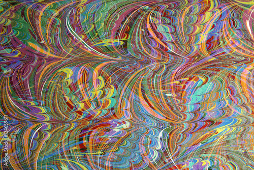 Ebru art. Traditional Turkish Ebru technique. Painting on water, followed by paper prints. Color paint ebru with waves and tile pattern.