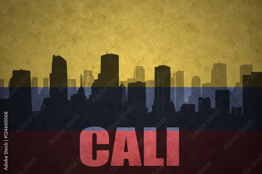 abstract silhouette of the city with text Cali at the vintage colombian flag