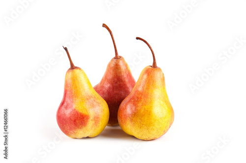 Yellow ripe fresh pear on white
