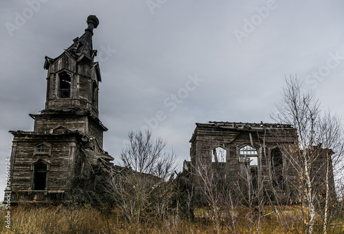 An old abandoned decayed wooden Church of the Intercession of the Holy Virgin in the village Aldia, Tambov region, Russia