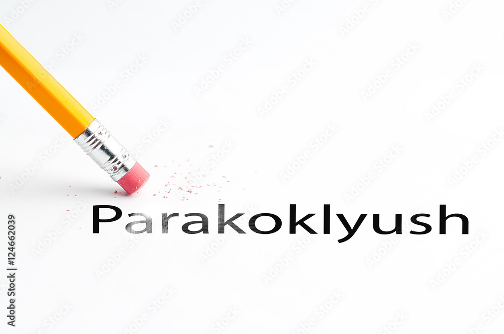 Closeup of pencil eraser and black parakoklyush text. Parakoklyush. Pencil with eraser. Closeup of pencil eraser and black parakoklyush text. Parakoklyush. Pencil with eraser.
