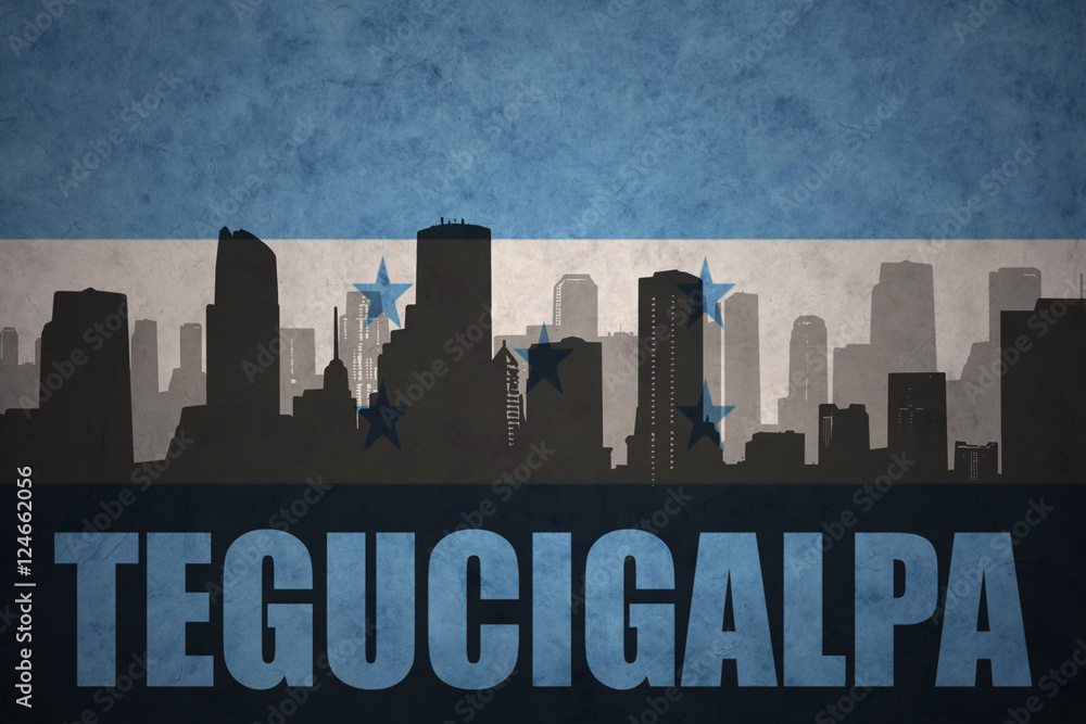 abstract silhouette of the city with text Tegucigalpa at the vintage honduras flag