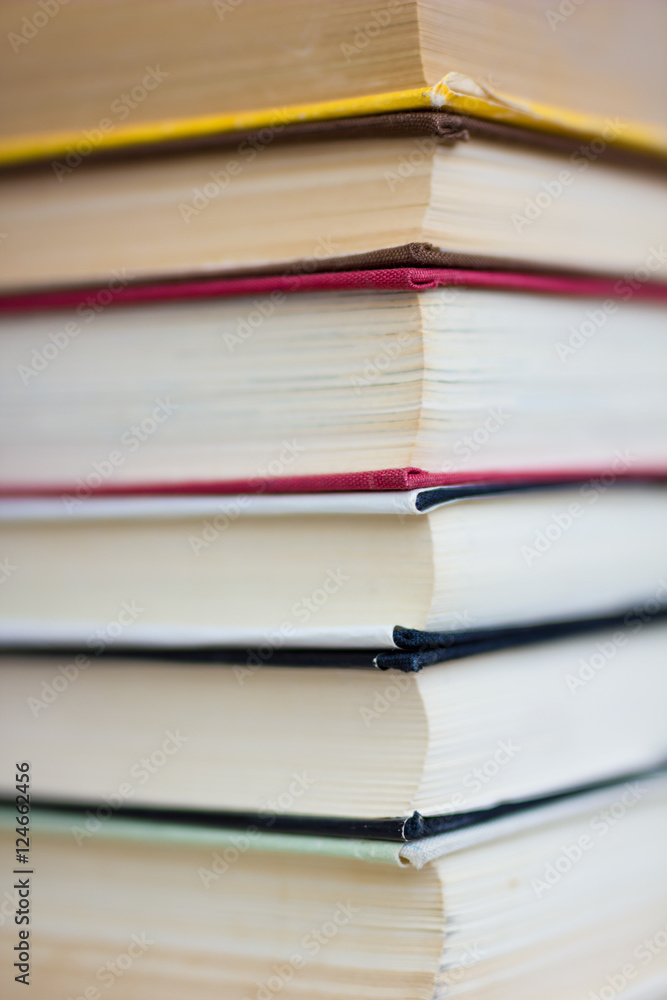 Closeup of stacked old books and textbook Closeup of stacked old books and textbook