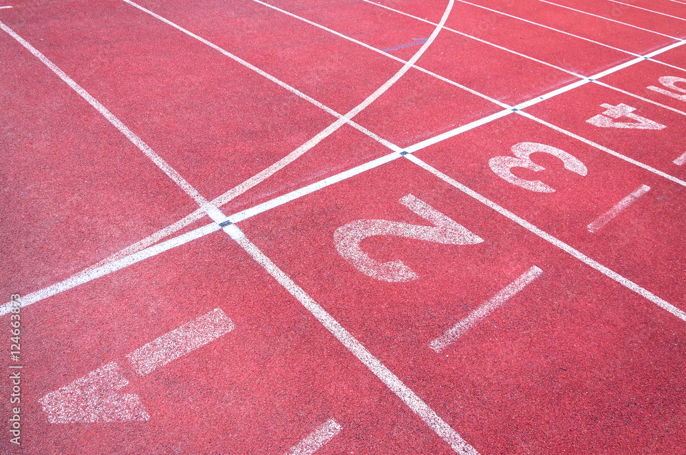 Numbers starting point on red running track,running track and green grass,Direct athletics Running track at Sport Stadium Numbers starting point on red running track,running track and green grass,Direct athletics Running track at Sport Stadium