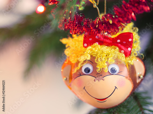 Fototapeta Naklejka Na Ścianę i Meble -  Smiling monkey christmas decoration