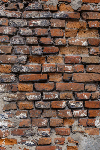 Old wall of red brick. Background  pattern  texture  vertical shot
