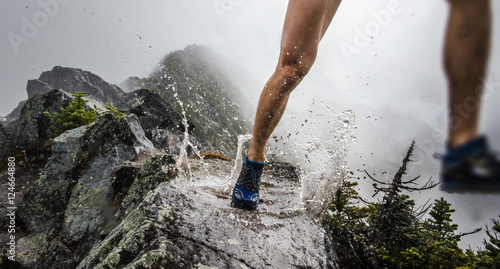 Runner puddle splash on ridgeline © Chris