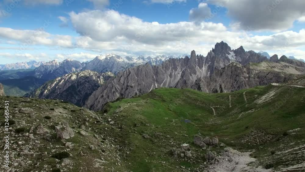 AERIAL VIEW: flight over National Park Tre Cime Di Lavaredo. Italian Dolomite