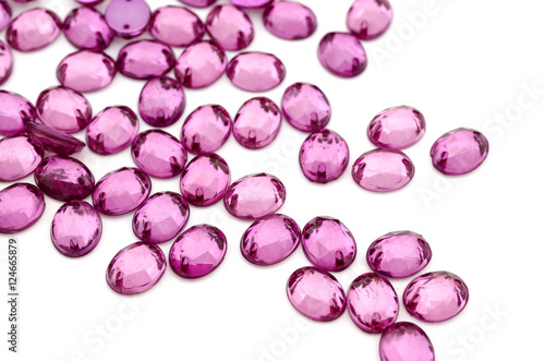 Purple rhinestone on white background 