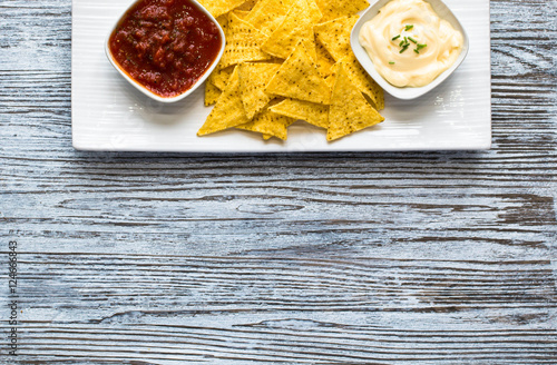 Mexican nachos chips  on wooden background
