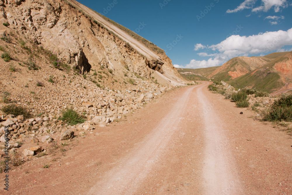 Traces of the car wheels on a mountain road