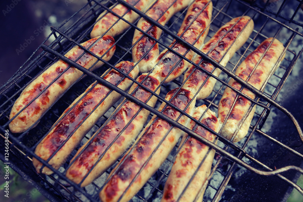Sausages roasted on the grill