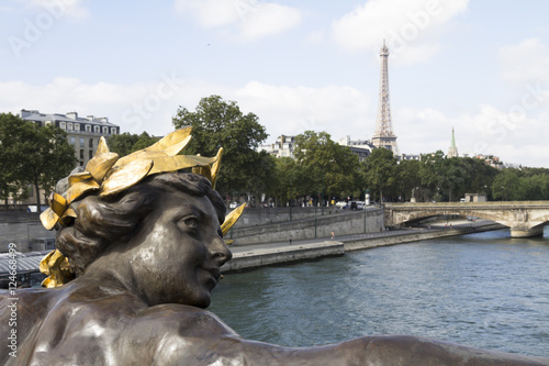 Closeup of a statue on the Pont Alexandre III, Paris, France
