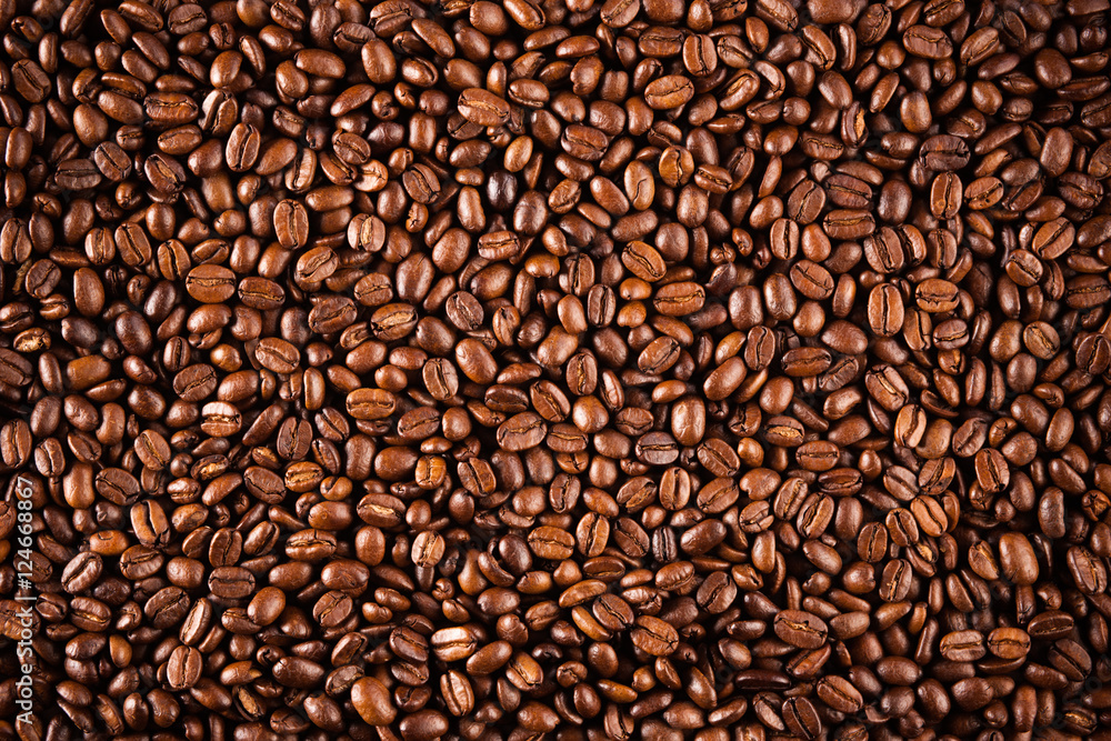 Coffee beans texture closeup. Brown coffee, background texture, closeup. Nice background for your ideas. Coffee beans texture closeup. Brown coffee, background texture, closeup. Nice background for your ideas.
