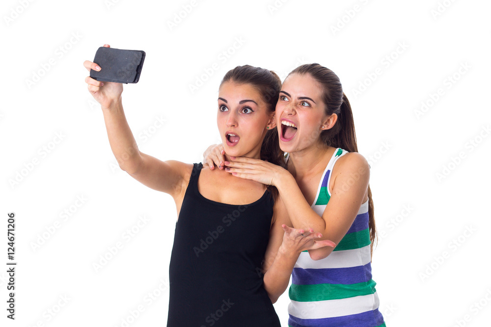 Two young women making selfie Two young women making selfie