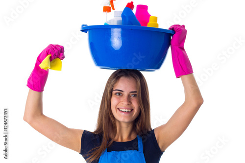 Woman holding cleaning things in washbowl