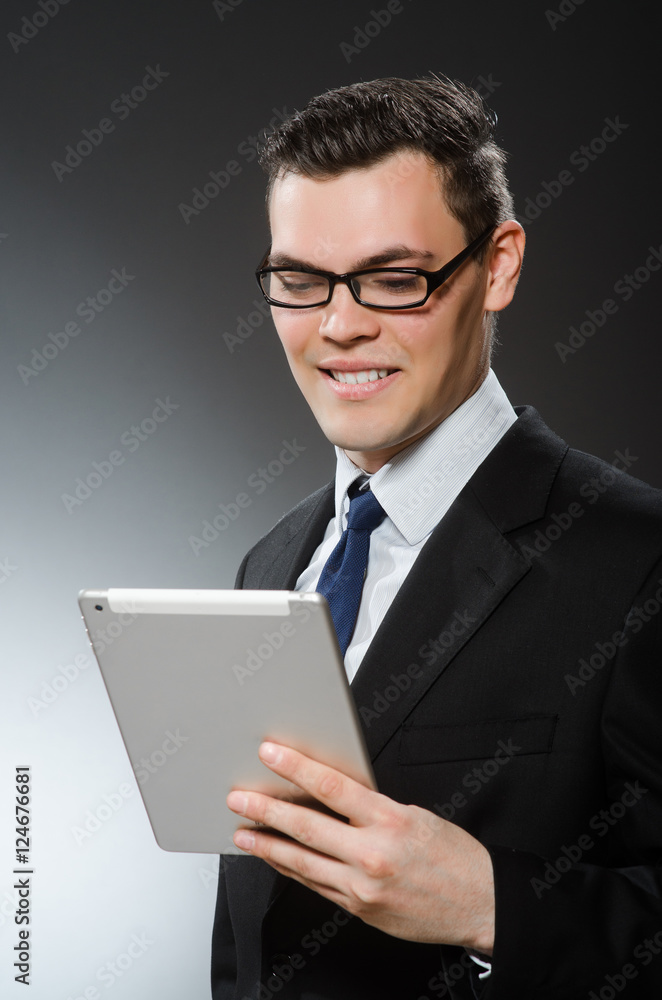 Businessman using his tablet computer in business concept Businessman using his tablet computer in business concept