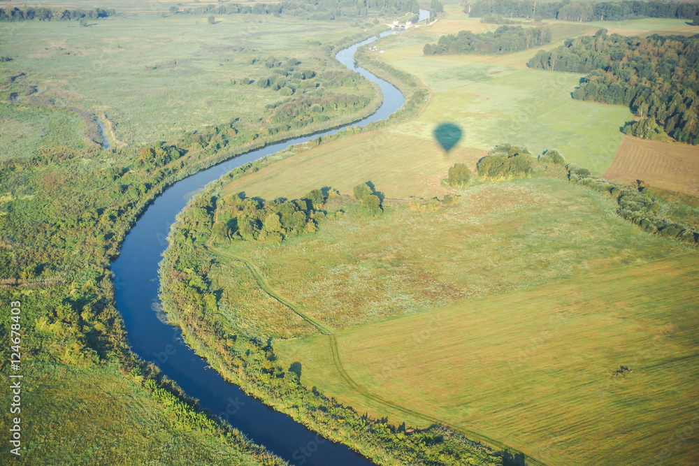 View from the balloon. Beautiful fields and river landscape. Balloon sunlight shadow. View from the balloon. Beautiful fields and river landscape. Balloon sunlight shadow.