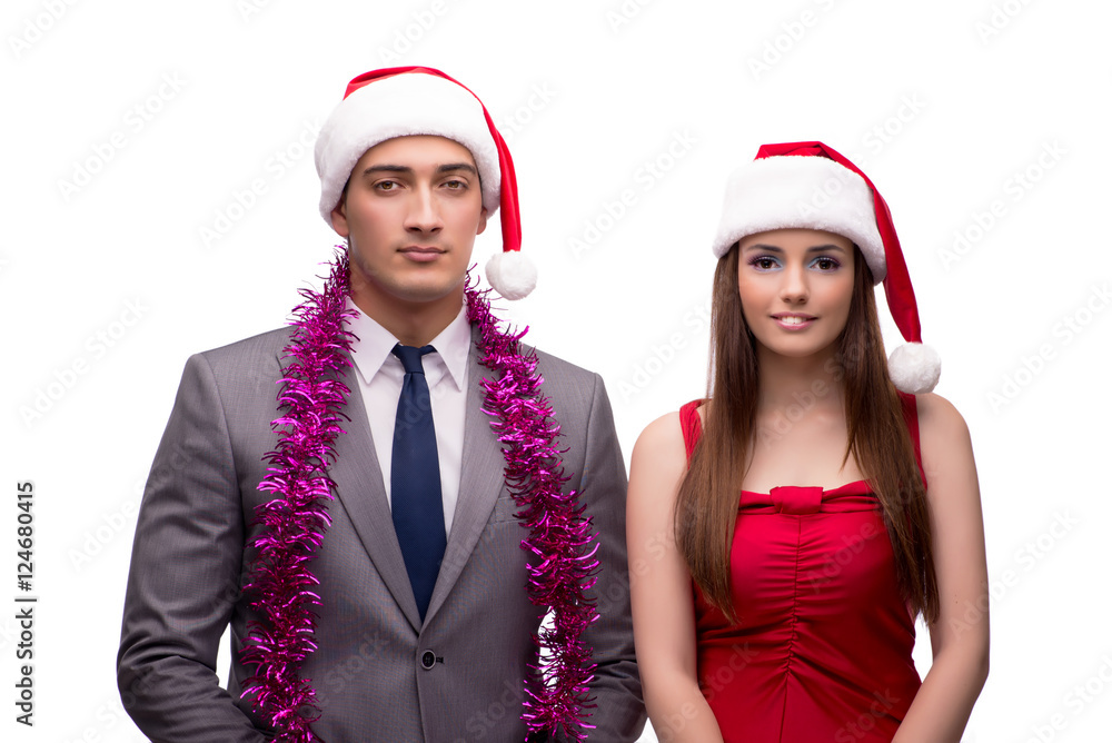 Pair celebrating christmas in the office isolated on white Pair celebrating christmas in the office isolated on white