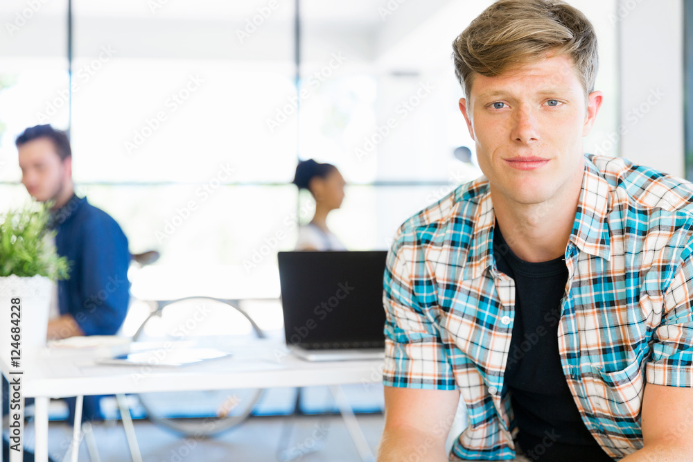 Young man working in office Young man working in office